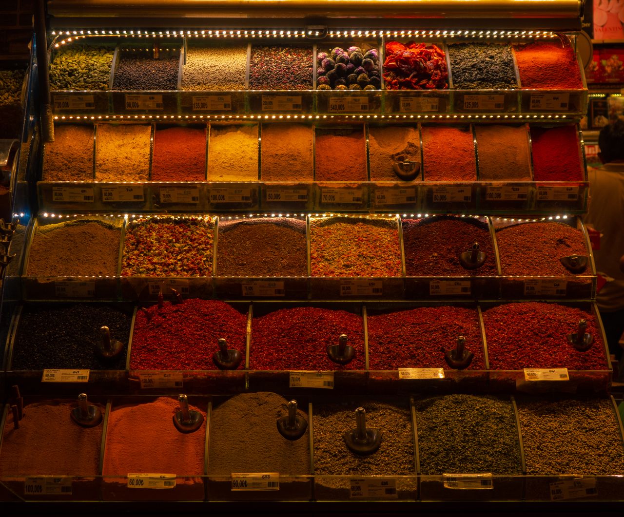 Colorful assortment of spices at a market stall in Istanbul, showcasing a rich variety.